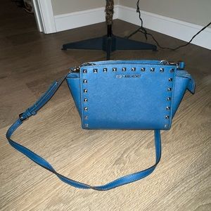 Michael Kors blue studded shoulder or crossbody bag.